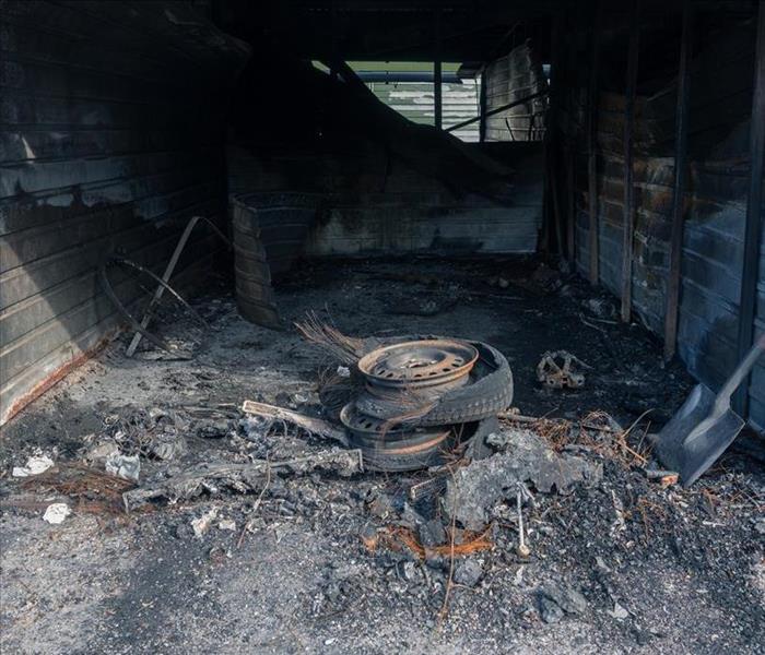 burned tire and rubble from a garage fire